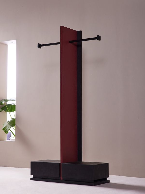 Totem Valet Stand in oxblood, an original Fengxiang design